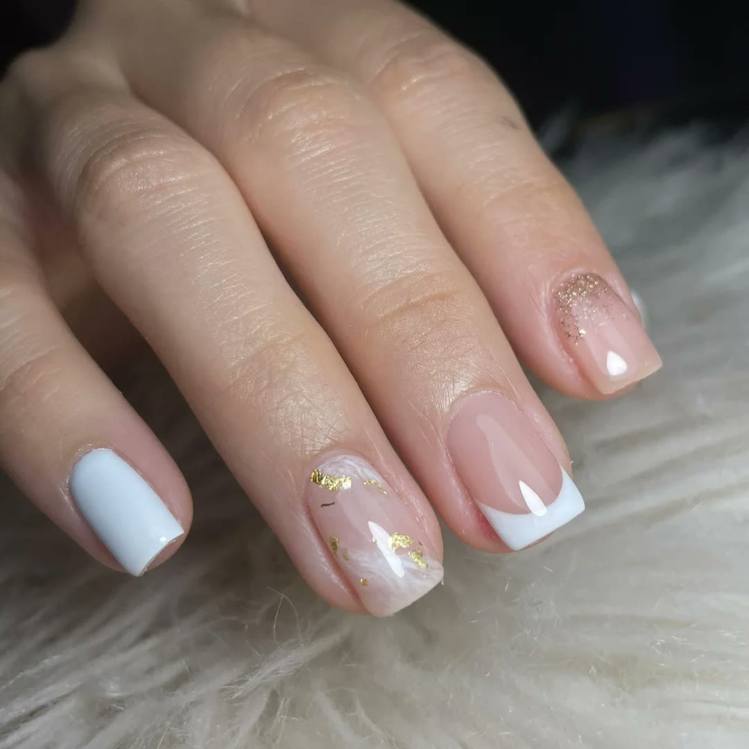 White French nails with gold foil detail